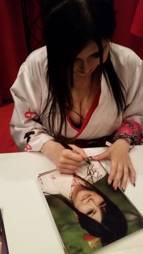 Anri Okita signing photos