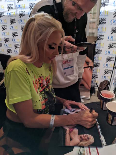 Courtney Taylor signing photos