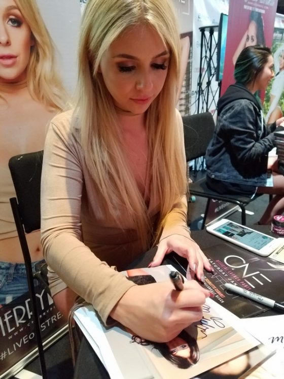 Madelyn Monroe signing photos