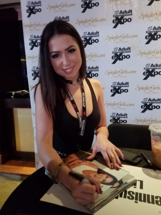 Melissa Moore signing photos
