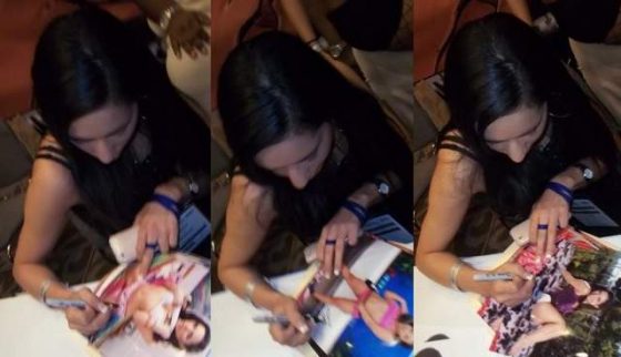 Tia Cyrus signing photos