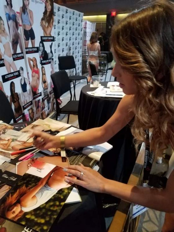 Uma Jolie signing photos