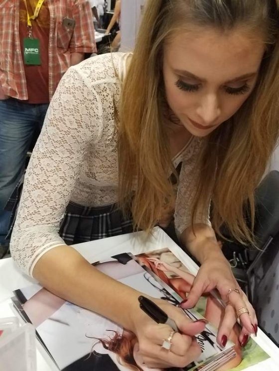 Anya Olsen signing photos