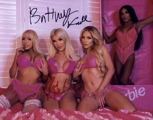 Trans Brittney Kade and (name21} signed 8x10 poster