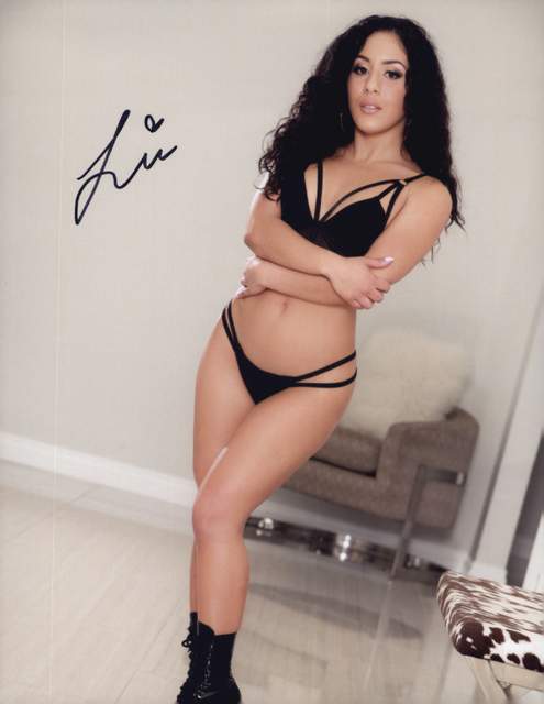 Liv Revamped signed 8x10 poster