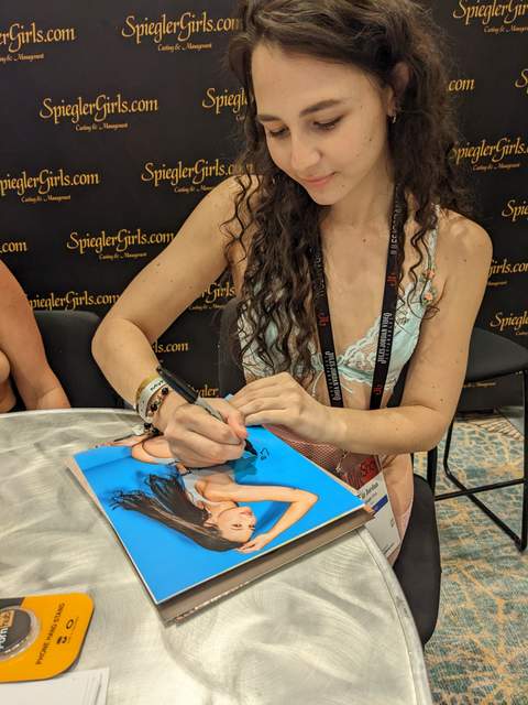 Liz Jordan signing photos