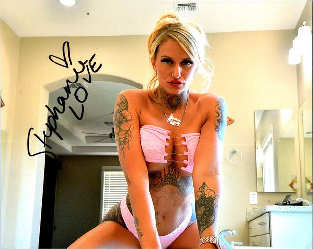 Stephanie Love signed 8x10 poster